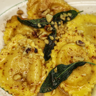Pumpkin Ravioli with brown butter and sage.  
